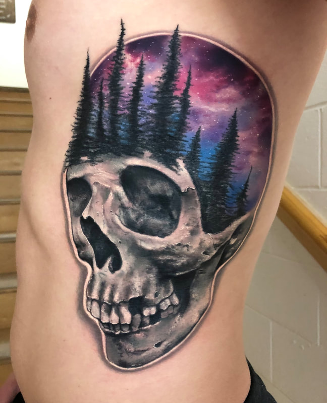 SpaceSkull tattoo by Andés Acosta